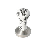 Motta 58mm coffee tamper with flat base and black & white wooden handle, designed for precise espresso tamping and elegant countertop display.