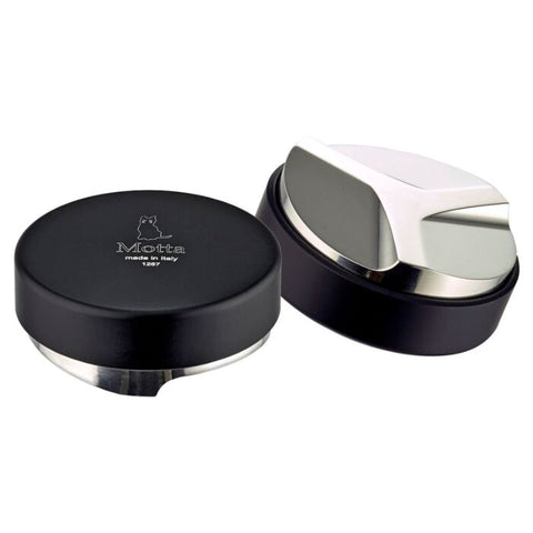 Metallurgica Motta black 58mm coffee levelling tool with angled stainless steel underside and engraved branding.